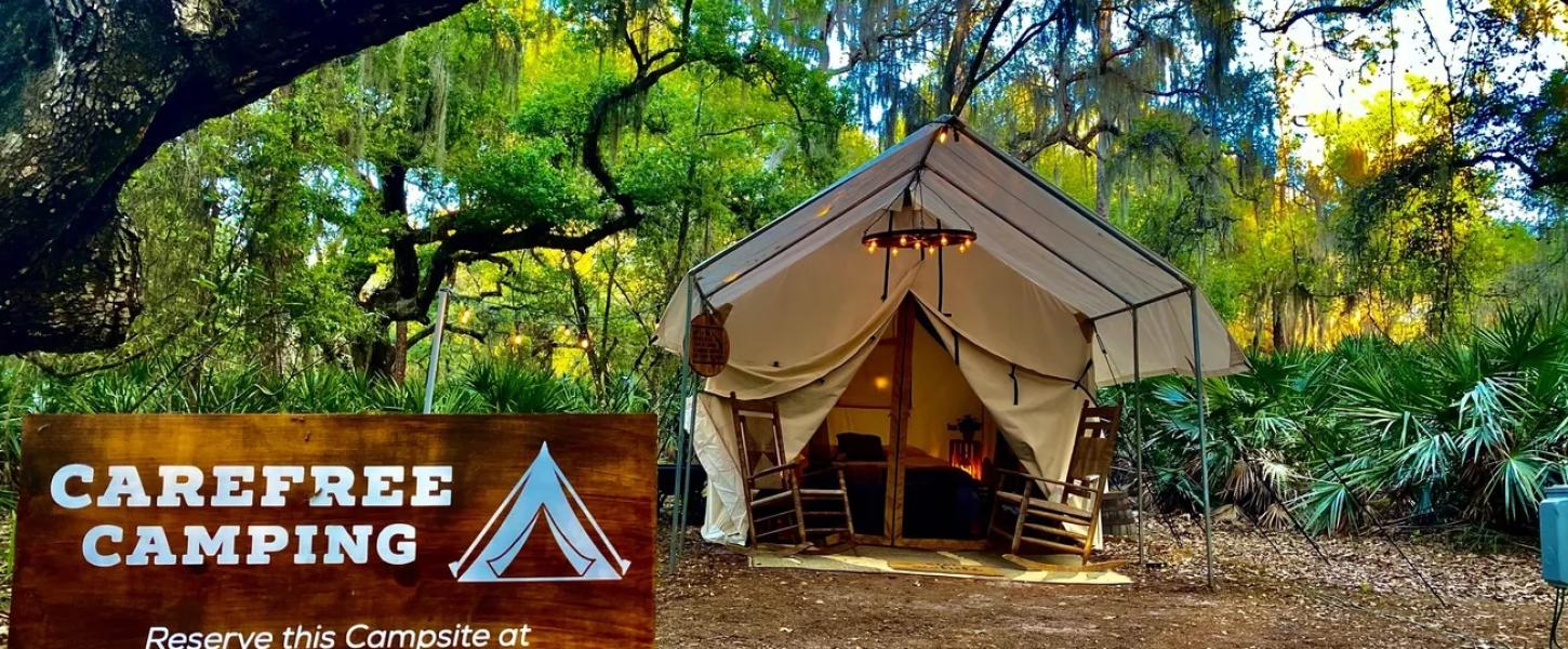 Tent for glamping under the trees at Lake Kissimmee State Park.